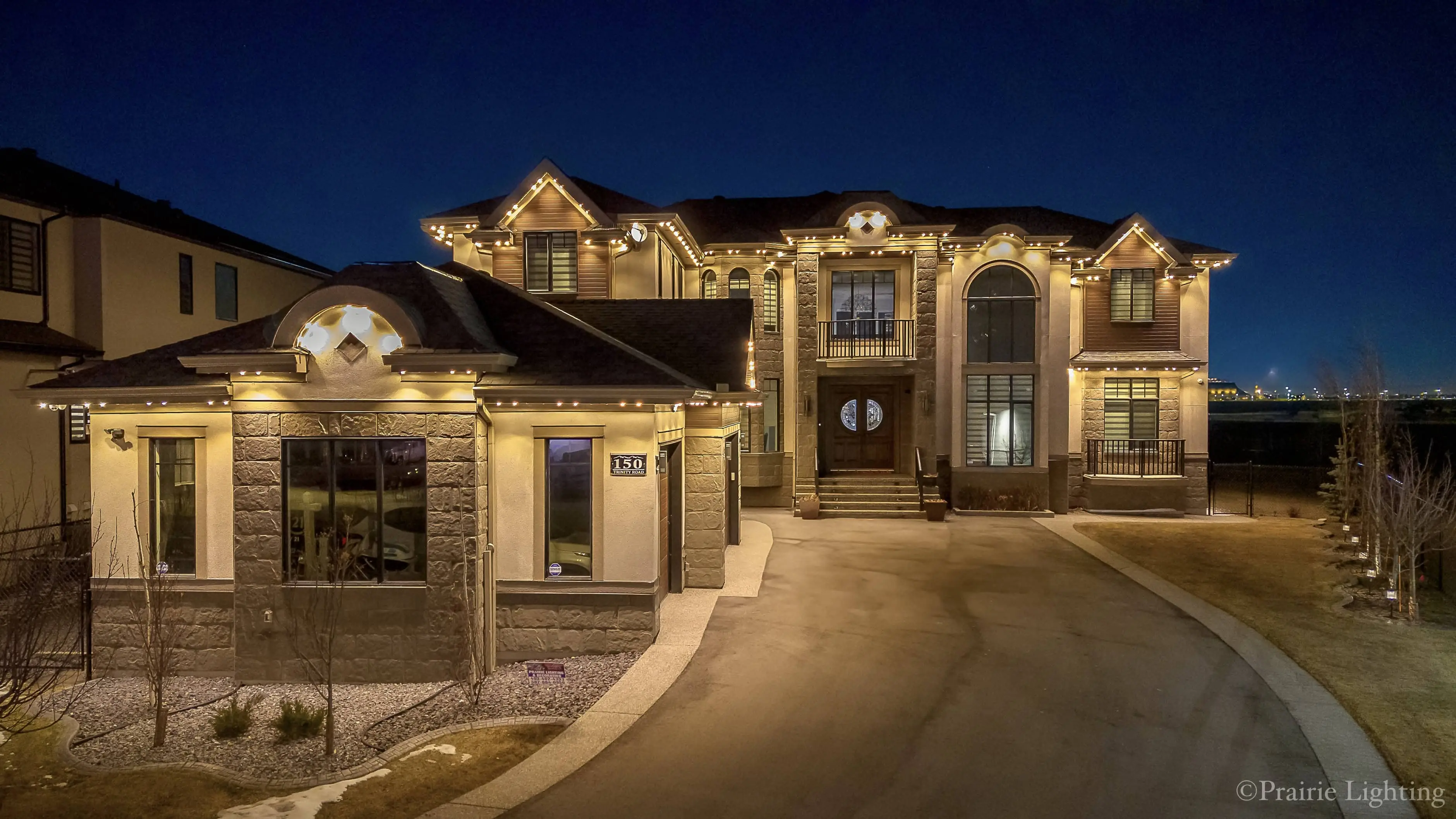 Prairie Lighting smart LED outdoor lighting on a home exterior
